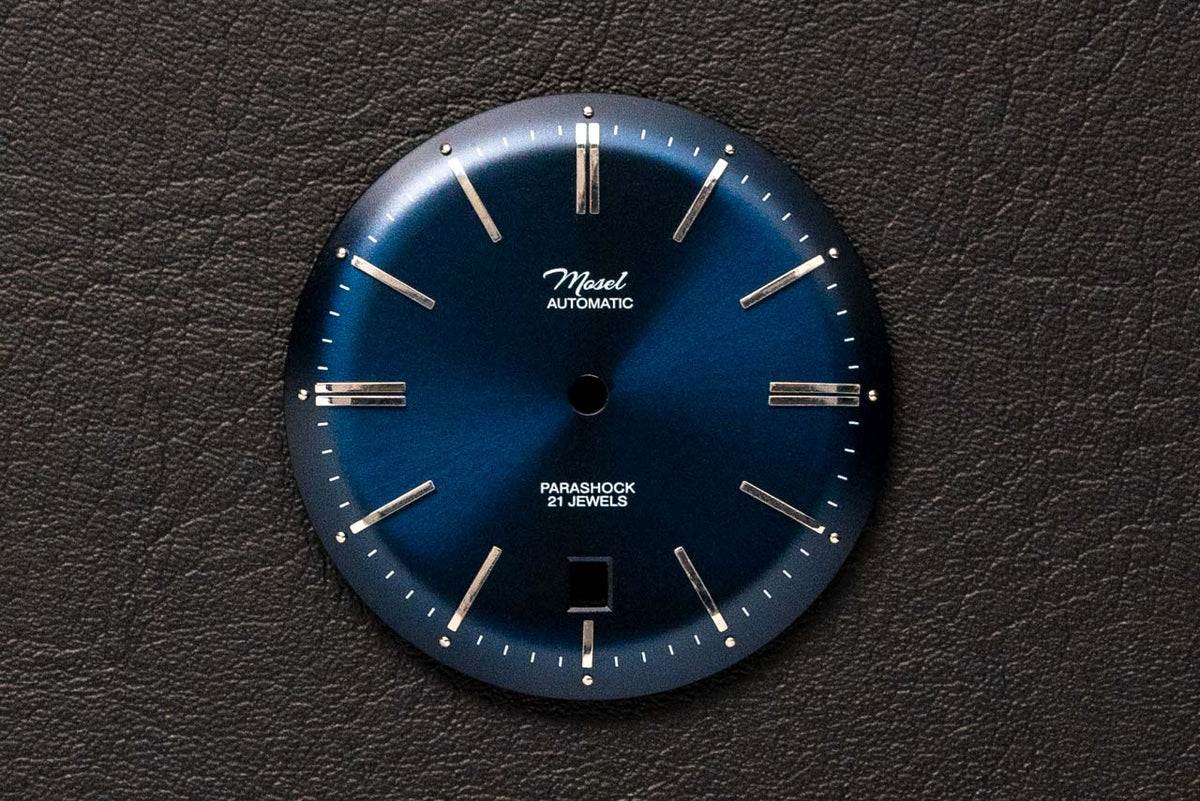 DWC - Blue domed sunray dial with applied indices and 6 o'clock