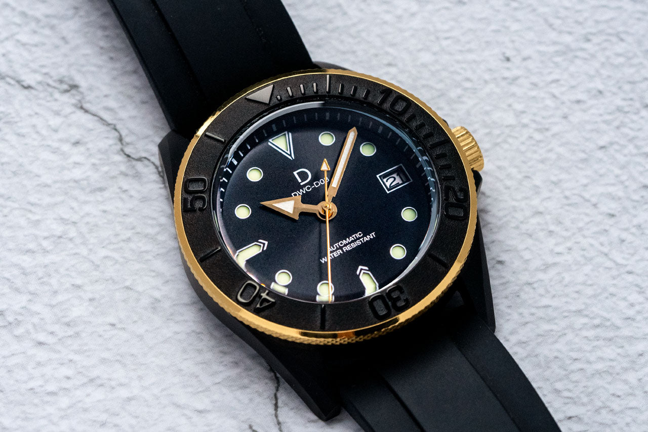 Black and gold dive watch - the perfect black X gold diver with superlume