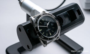 Adjusting an automatic watch with a timegrapher