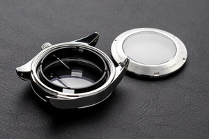 Explorer style Seiko mod case pack with movement holder, chapter ring, stem, crown and exhibition case back