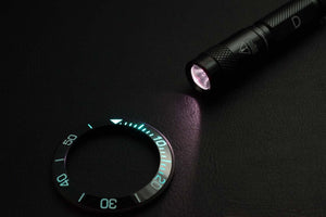 Charging lume with colorless UV flashlight